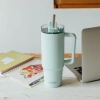 Quokka Stream - Kubek termiczny ze stali nierdzewnej 950 ml ze słomką (Turquoise)